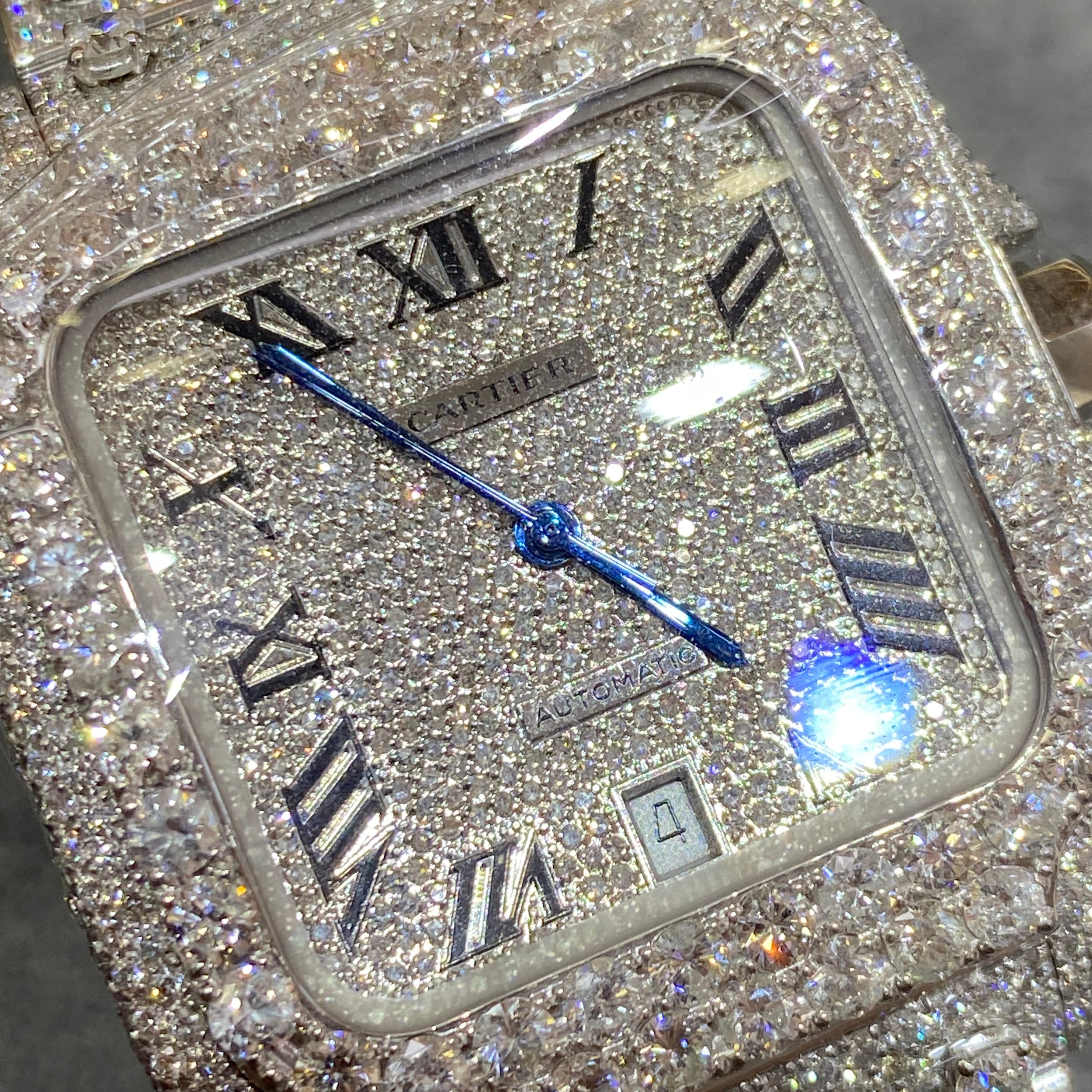 41mm cartier "iced bust down" watch. vs1 natural diamonds 25 cts t.w.. white