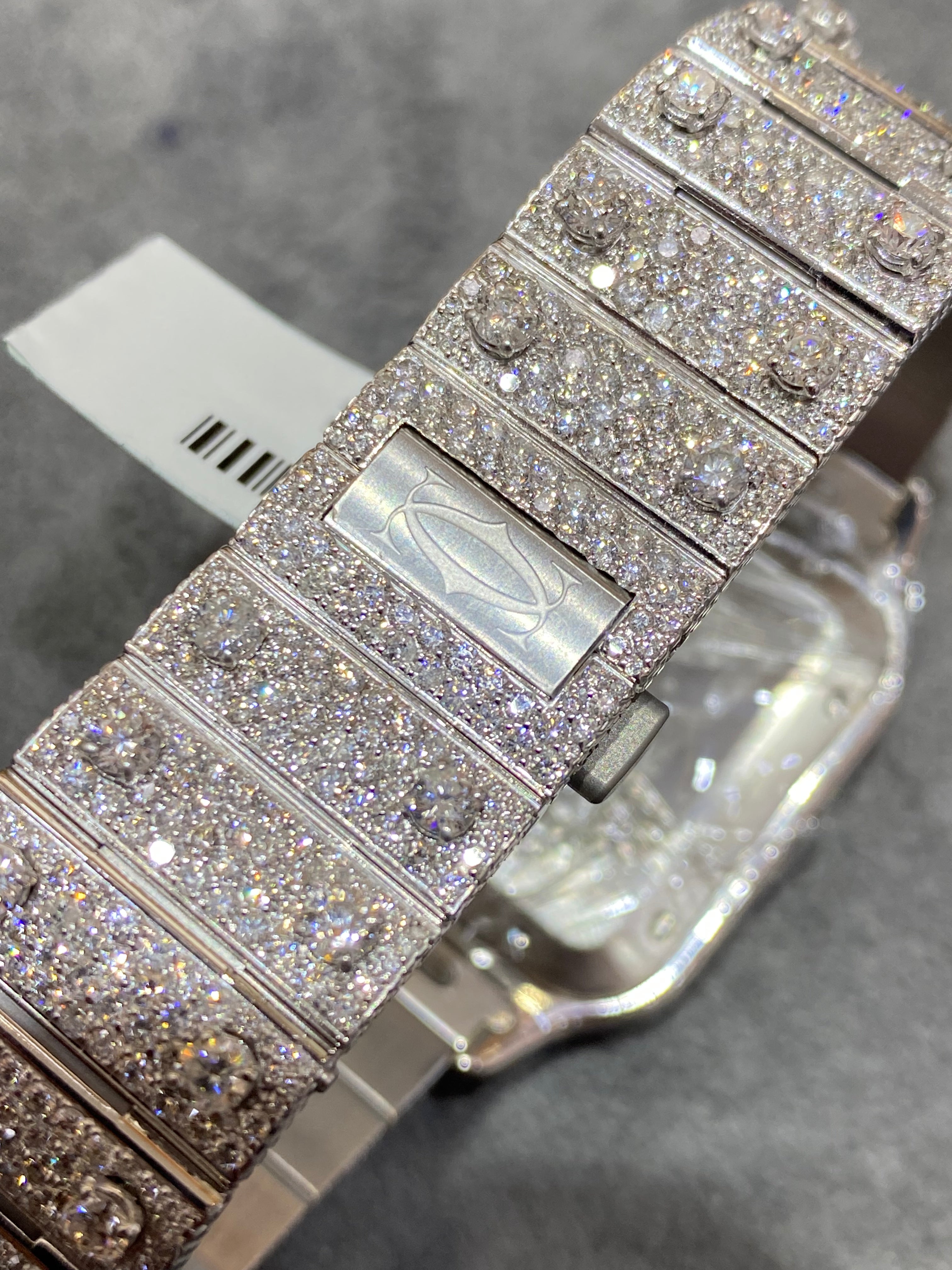 41mm cartier "iced bust down" watch. vs1 natural diamonds 25 cts t.w.. white